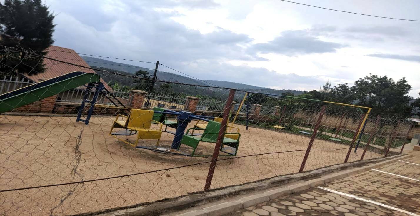 Playground swings used by learners at the school